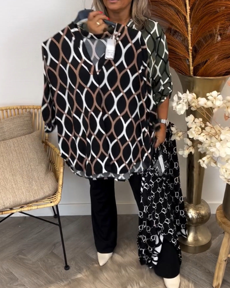 NORA | Figure-flattering blouse with elegant pattern