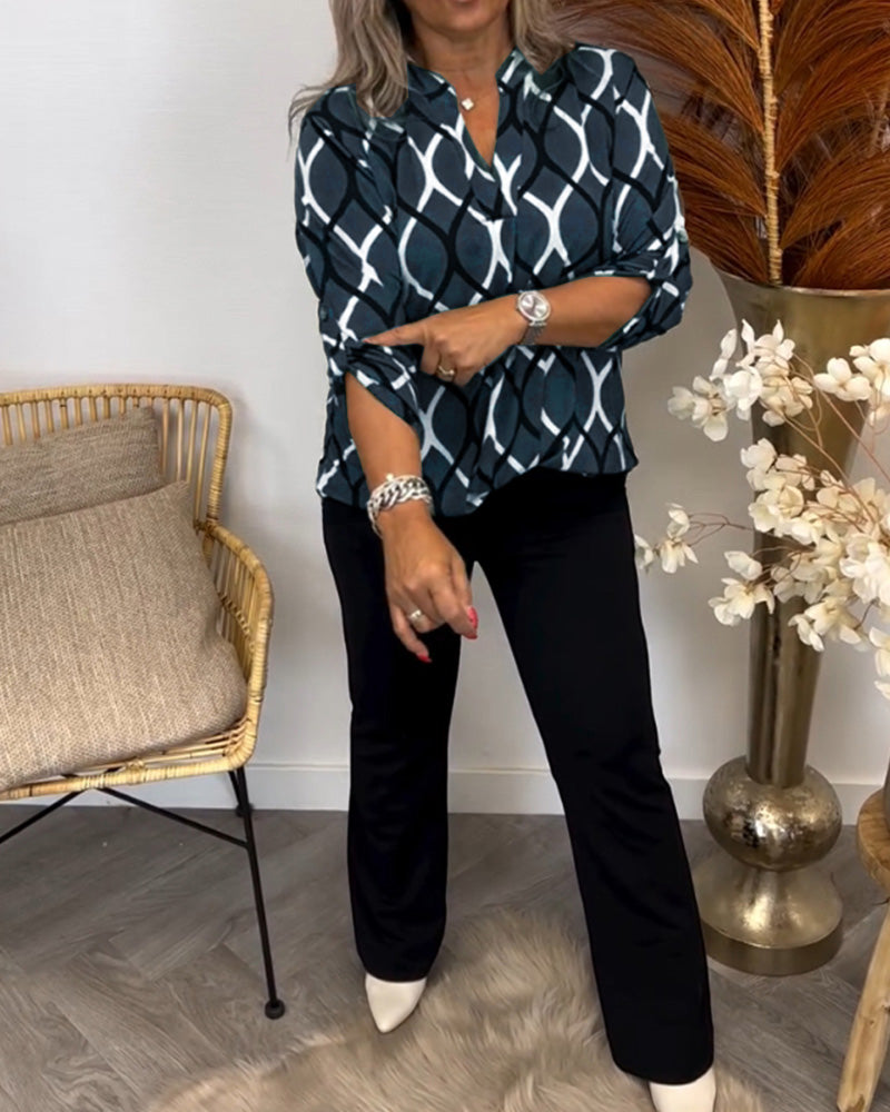 NORA | Figure-flattering blouse with elegant pattern